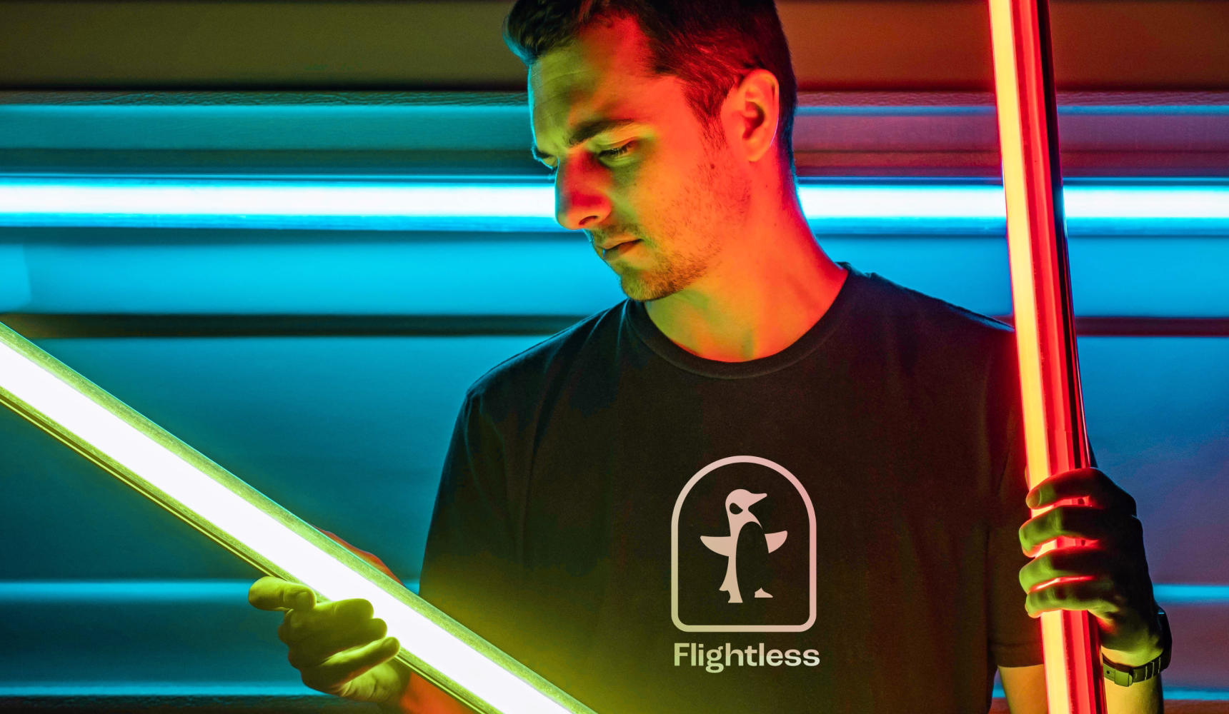 Flightless logo on t-shirt - video production firm branding