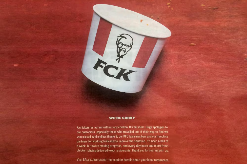 Photo of an empty bucket of chicken from KFC, reading "FCK," with an apology statement for running out of chicken.