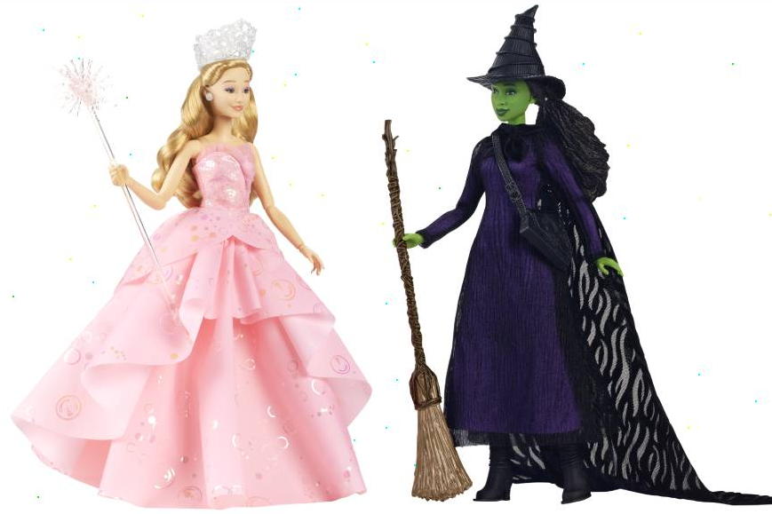 Glinda and Elphaba dolls from the "Wicked" movie, with a blonde Glinda wearing pink and a green Elphaba wearing black and purple.